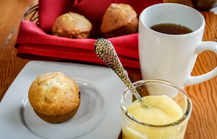 Coffee and muffins with lemon curd.