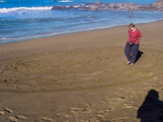 Took this photo of Chris walking a labyrinth she made on the beach in Crescent City, California back in September 14, 2003.
